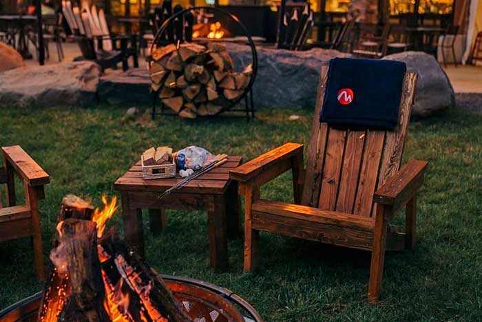 chairs on the hill with firepit