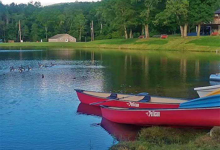 camp dina canoes on the lake