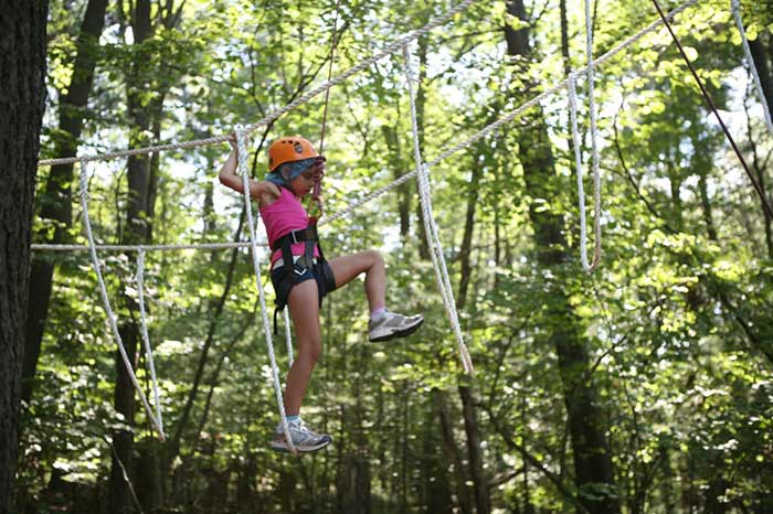 camp-timber-tops-girl-on-ropes-course