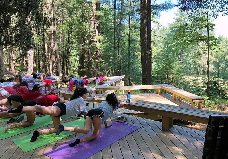 camp-timber-tops-girls-doing-yoga