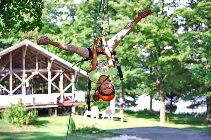 camp zeke camper on the zipline