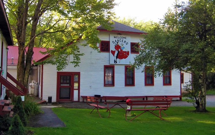 1940s dance hall with park benches