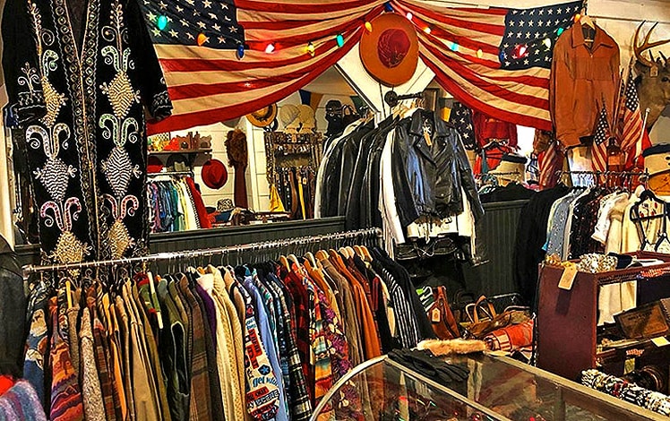 racks of clothes inside store