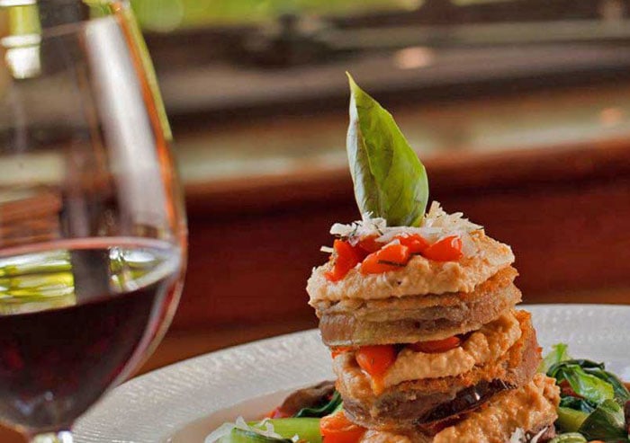 dining-room-at-settlers-inn-eggplant-stack-and-wine