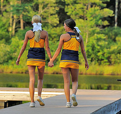two girls on pier