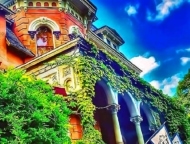 harry packer mansion front porch covered in ivy
