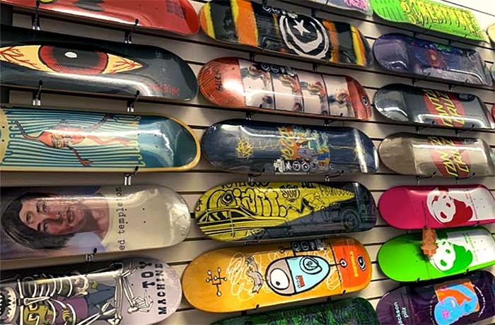 holy stokes wall of skateboards