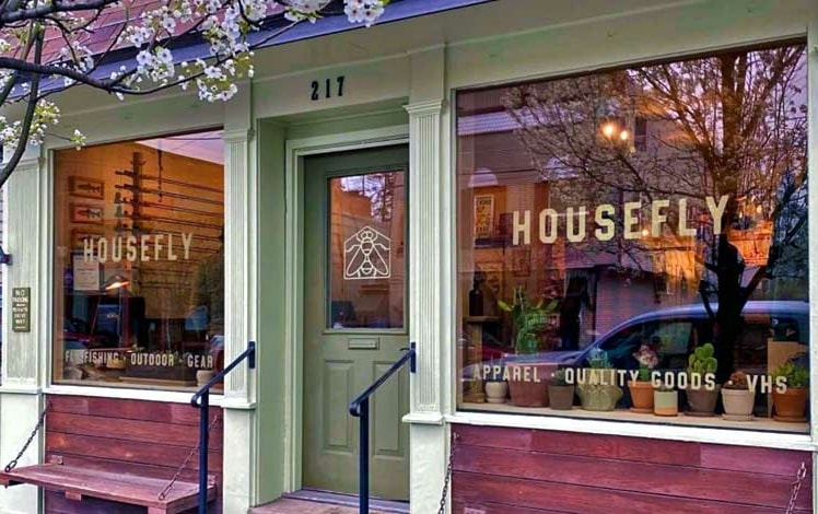 housefly fishing exterior storefront