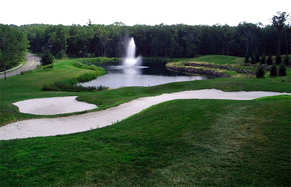 jack-frost-national-golf-course-ond-and-waterfall-with-sand-traps