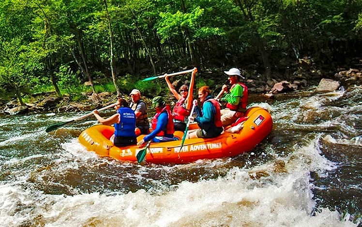 Jim Thorpe River Adventures people in raft on the river