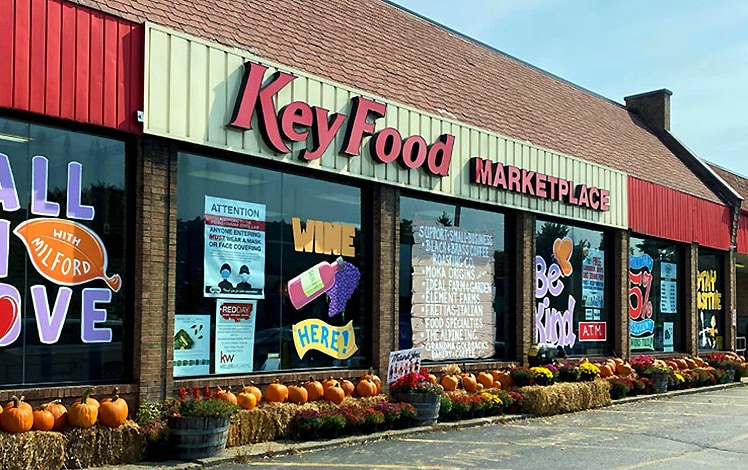 key food milford store exterior with pumpkins for sale