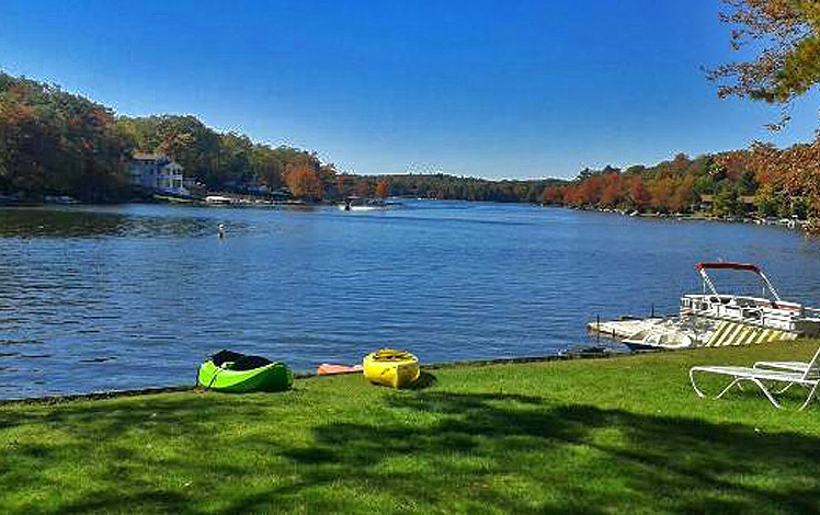 pocono mountain rentals kayaks on the lake shore