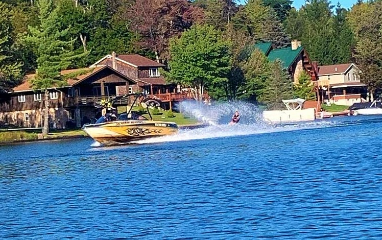 lake harmony watersports boat with water skier