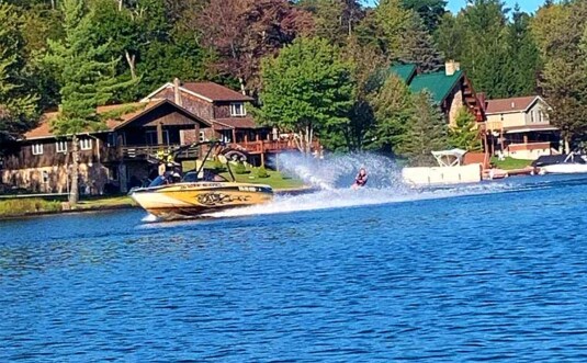 lake harmony watersports boat with water skier
