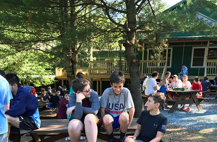 lake-owego-camp-for-boys-boys-at-picnic-tables
