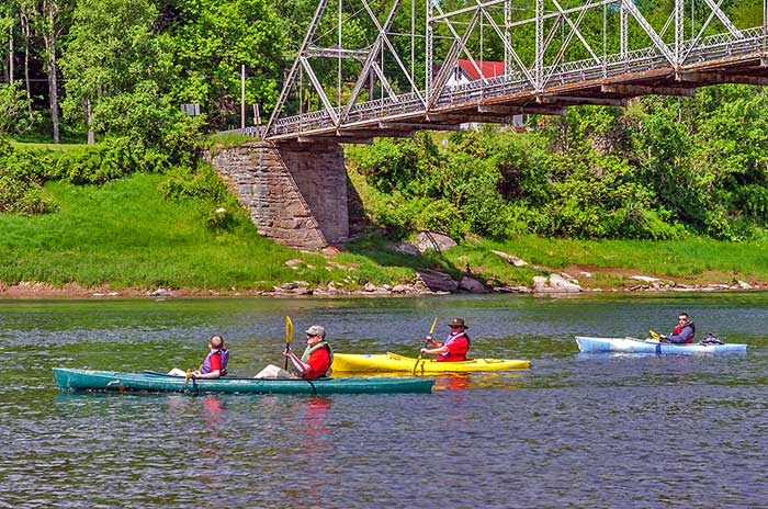 lander's river trips canoes under bridge