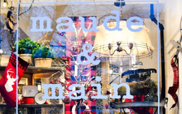 France, Paris, woman showing souvenir in a gift shop stock photo