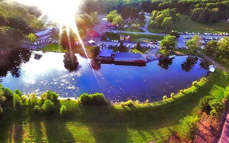 aerial view of memorytown lake and buildings