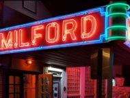 milford theater exterior neon sign