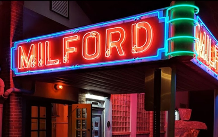 milford theater exterior neon sign