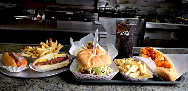 paulie's-hot-dogs-honesdale-lineup-of-sandwiches-and-fries-with-coca-cola