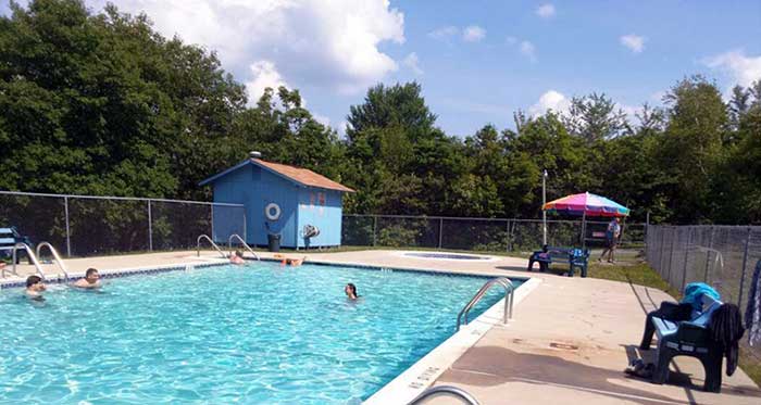 peaceful-woodlands-family-campground-heated-outdoor-pool