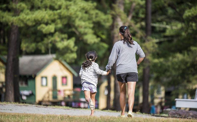 pine-forest-ccamp-counselor-and-child