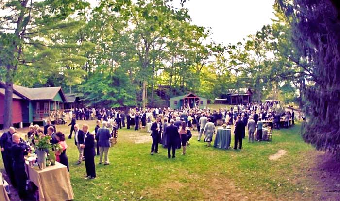 pine forest camp wedding cocktail reception outdoors
