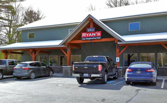 Ryan's Deli building exterior front and parking lot