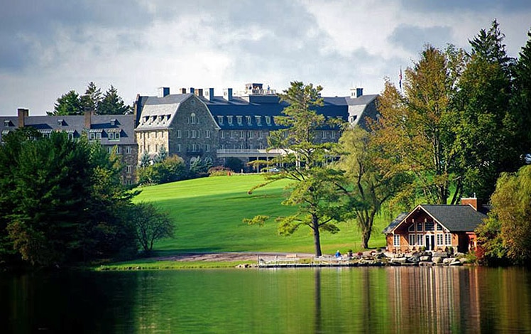 Skytop Lodge main lodge, lawn, lake, and boathouse