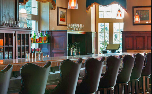 Skytop Lodge bar front and barstools