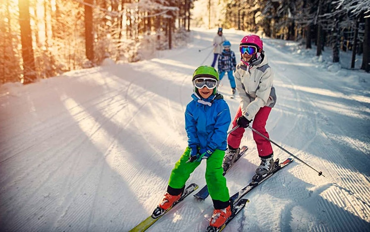 skytop lodge line of kids on skis