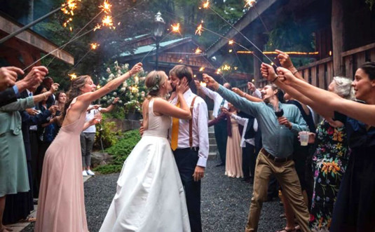 tall-timber-barn-couple-sendoff-with-sparklers