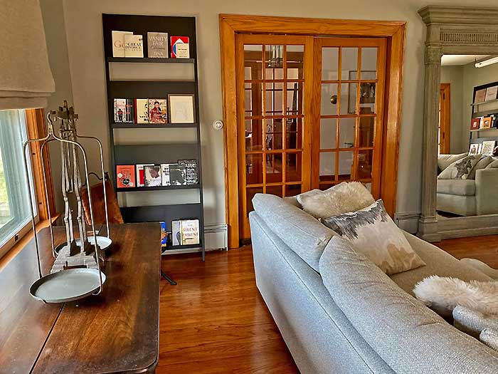 couch and windows in corner of living room