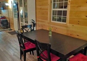 the farm sanctuary cabin porch and dining table