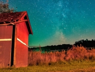shed on farm property at night