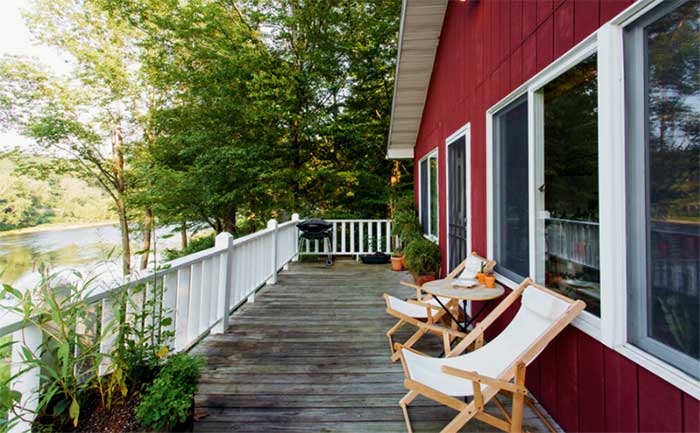 the river house deck overlooking river